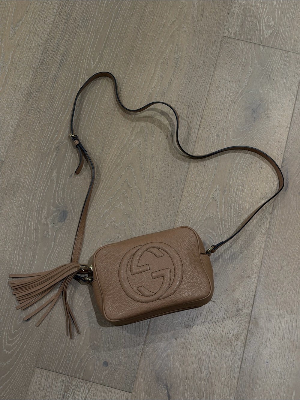 Gucci Pebbled Leather Crossbody Bag in Taupe